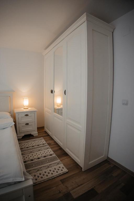 Postel nebo postele na pokoji v ubytování Boierița Home Stay