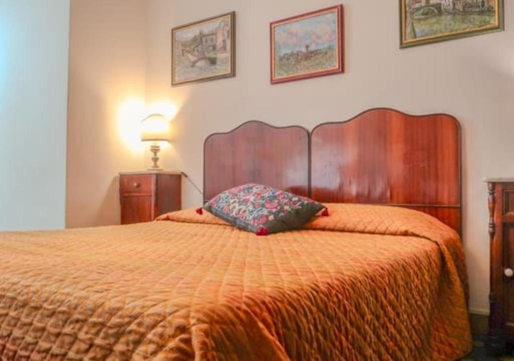 Postel nebo postele na pokoji v ubytování Bridge Hotel