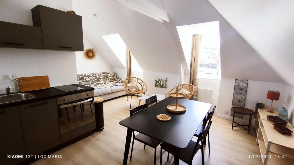 Kuchyň nebo kuchyňský kout v ubytování Le Roi de Guerveur - Appartement vue mer