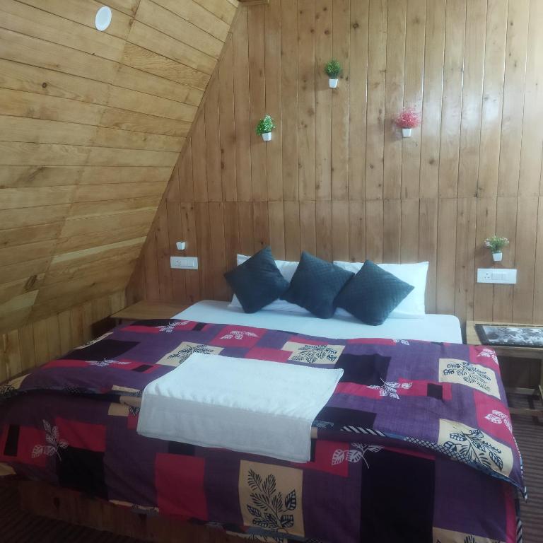 Ένα ή περισσότερα κρεβάτια σε δωμάτιο στο Green hill cottage