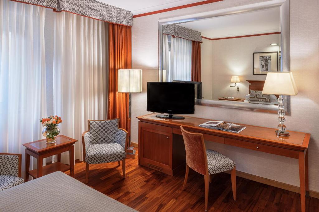 TV a/nebo společenská místnost v ubytování Starhotels Metropole