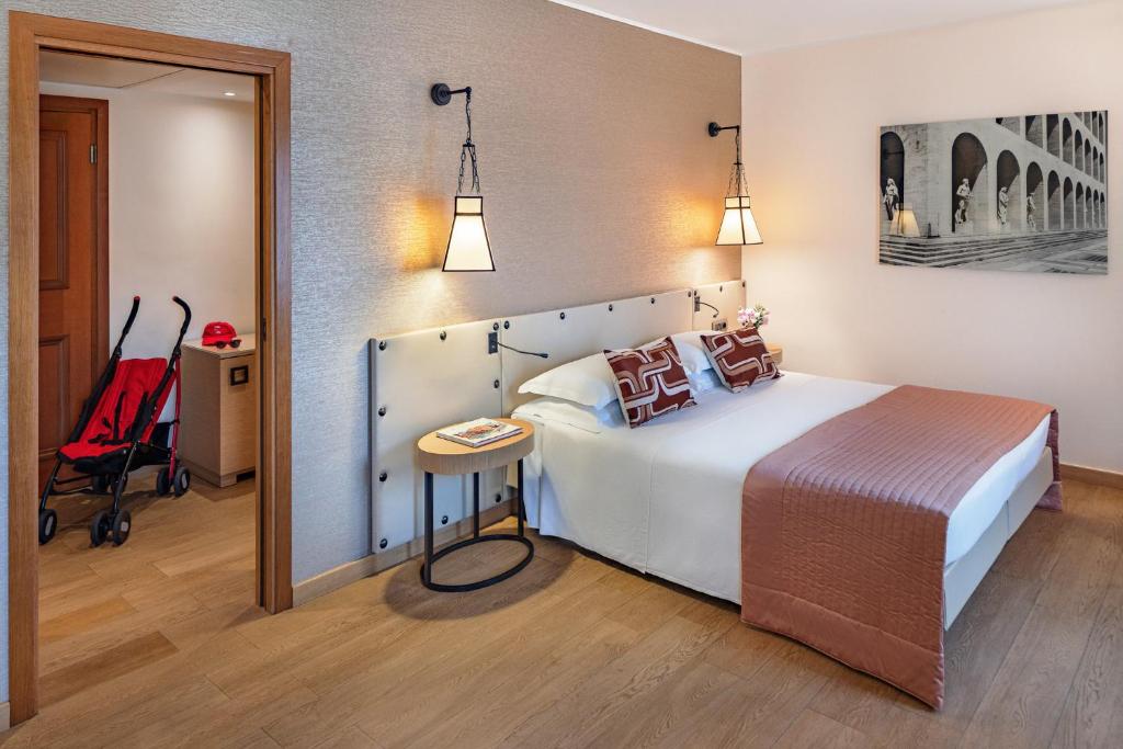 Postel nebo postele na pokoji v ubytování Starhotels Metropole