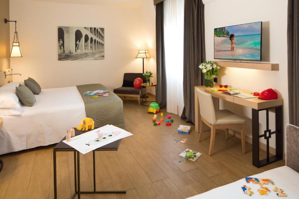 Postel nebo postele na pokoji v ubytování Starhotels Metropole