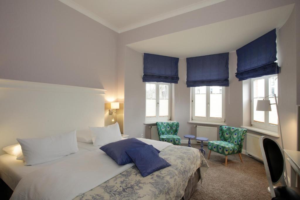 Ein Bett oder Betten in einem Zimmer der Unterkunft Schloss Basthorst