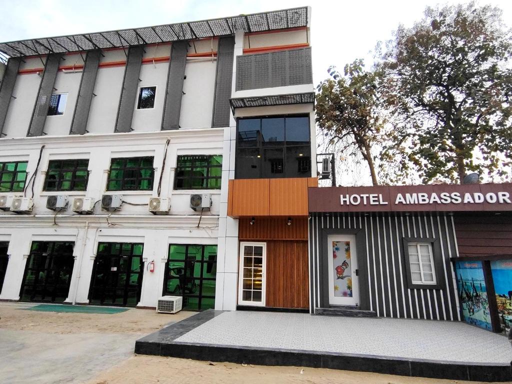 a building with a hotel amazespoon written on it at Hotel Ambassador Varanasi in Varanasi