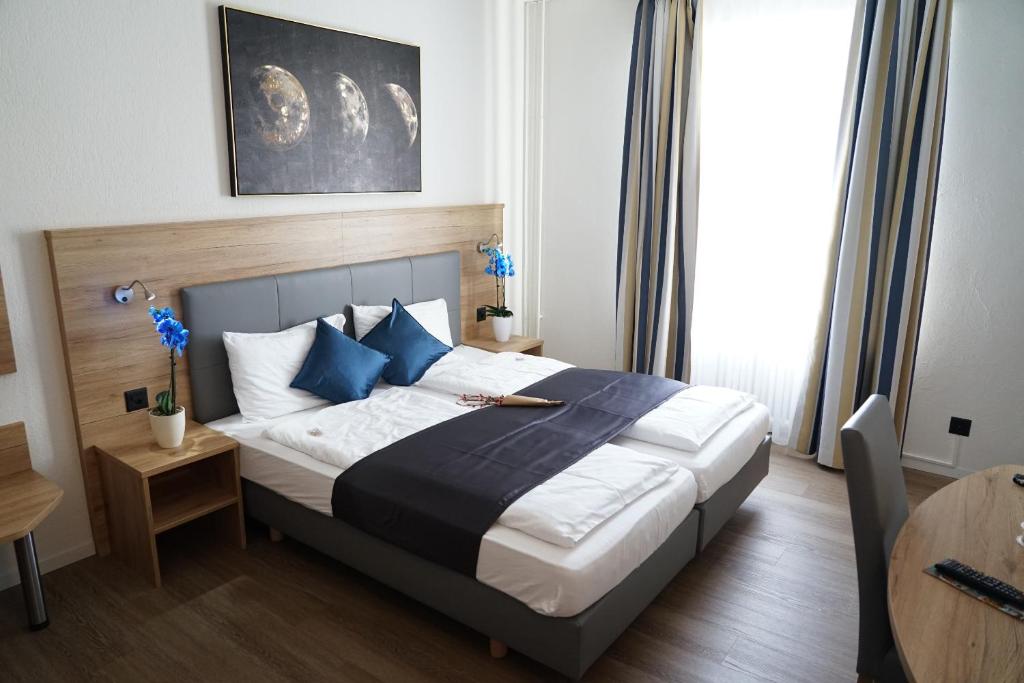 Voodi või voodid majutusasutuse Centra Hotel Winterthur toas