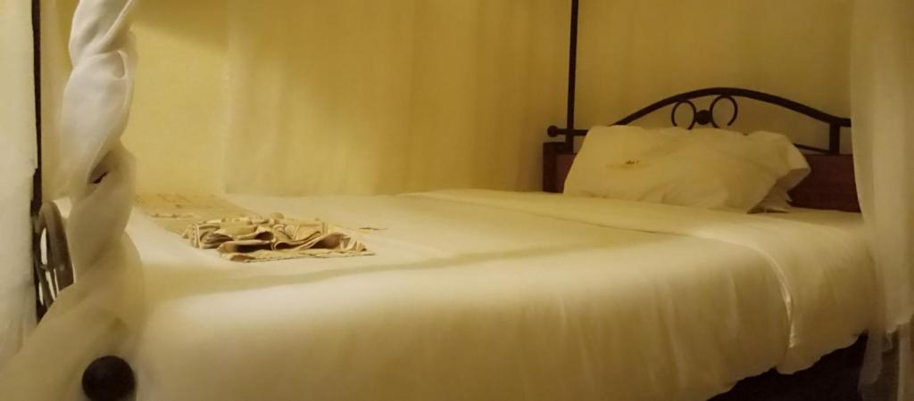 Postel nebo postele na pokoji v ubytování Urbane Hotel Urbane Plaza