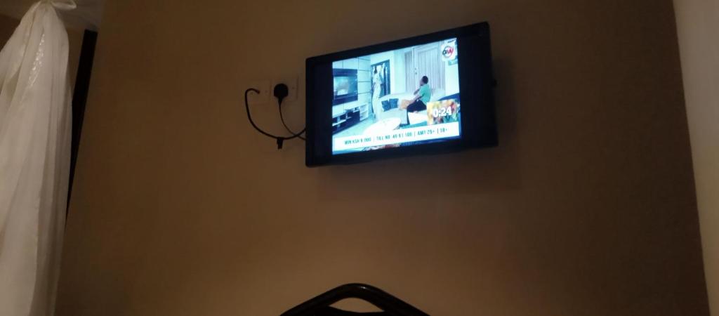 TV a/nebo společenská místnost v ubytování Urbane Hotel Urbane Plaza