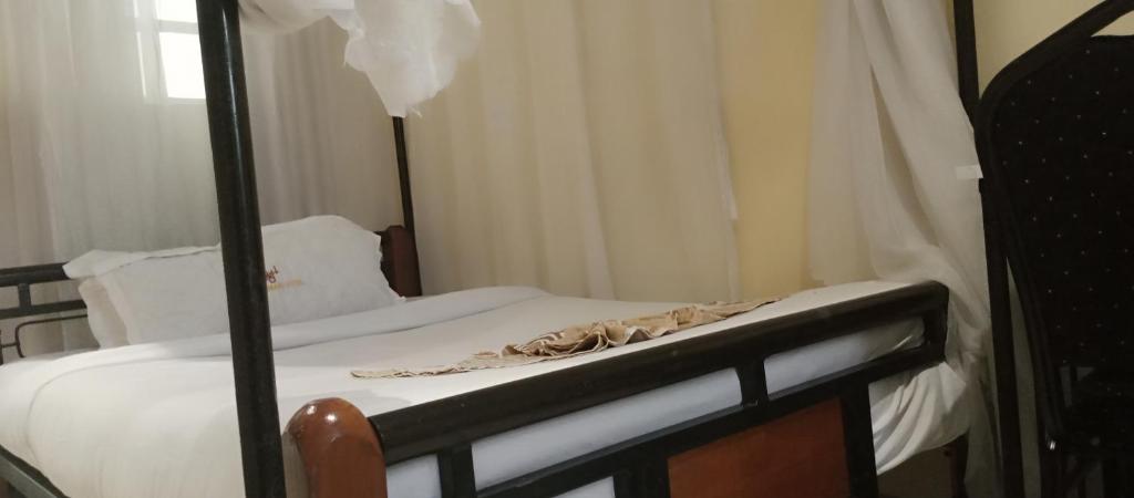 Postel nebo postele na pokoji v ubytování Urbane Hotel Urbane Plaza