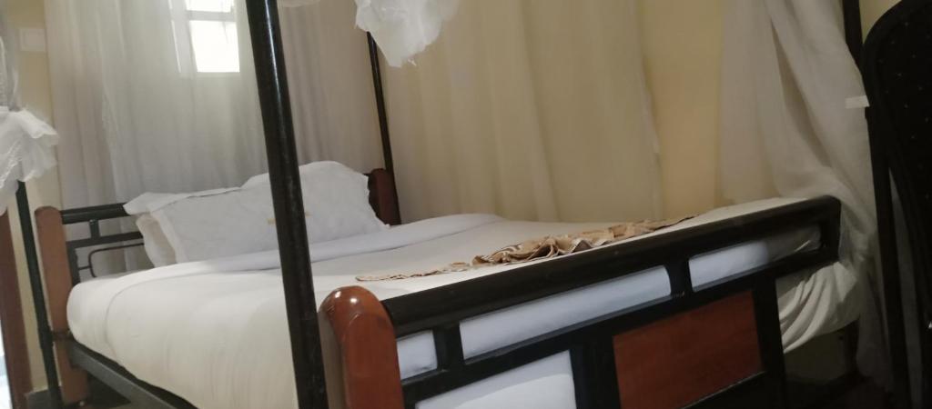 Postel nebo postele na pokoji v ubytování Urbane Hotel Urbane Plaza