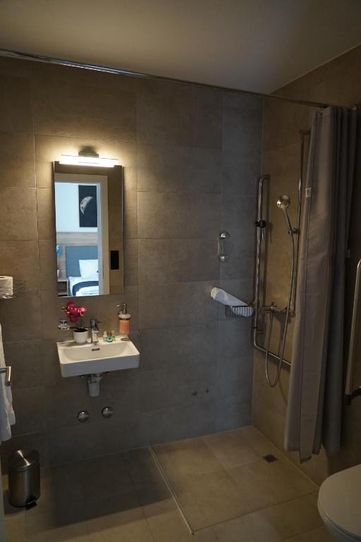 Vannituba majutusasutuses Centra Hotel Winterthur