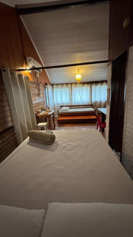 Katil atau katil-katil dalam bilik di Vila Flor Residence