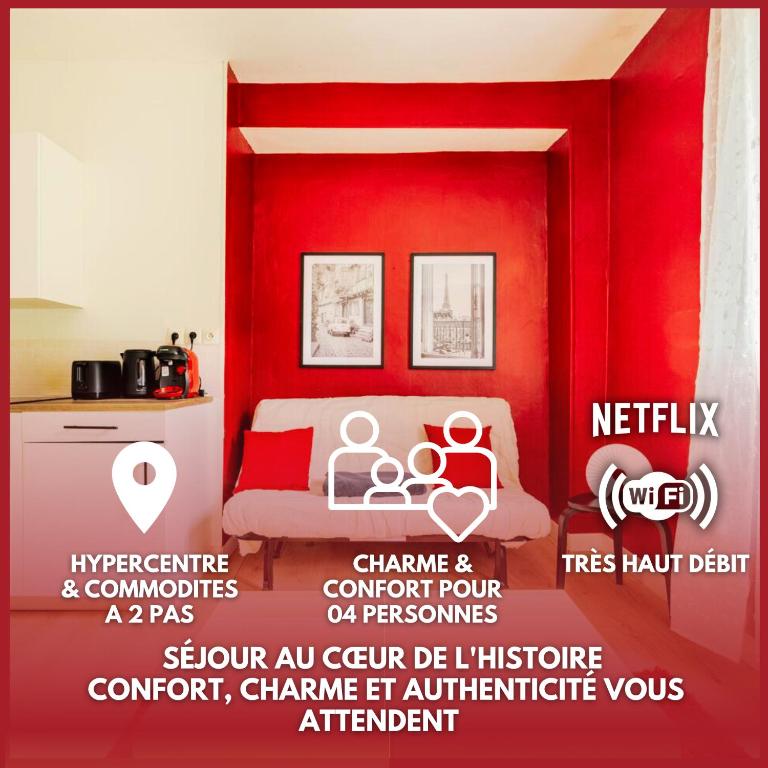 une affiche d'une chambre avec un mur rouge dans l'établissement Château Rubis T2 hypercentre historique au pied du château, à Château-Thierry