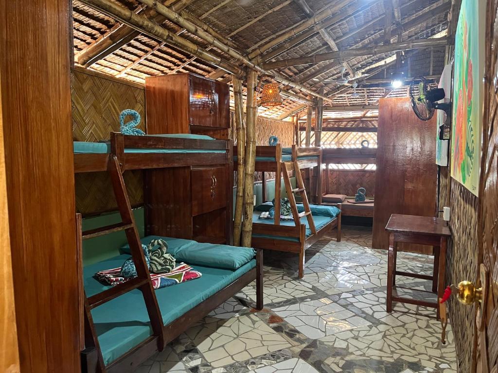 Area soggiorno di Bamboo Nest Beachfront