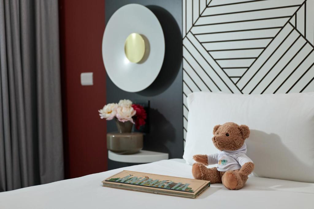 Uma cama ou camas num quarto em Quark Hotel Milano