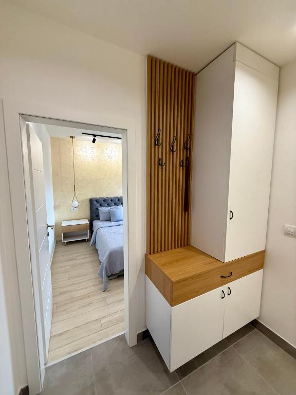Postel nebo postele na pokoji v ubytování Cvetkovic apartman