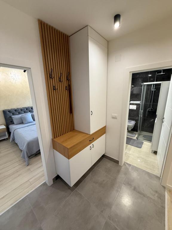 Postel nebo postele na pokoji v ubytování Cvetkovic apartman