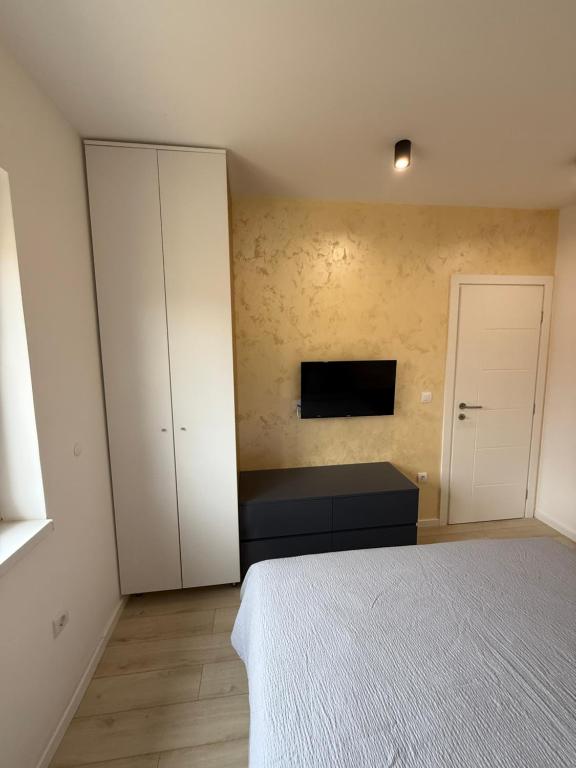 Postel nebo postele na pokoji v ubytování Cvetkovic apartman