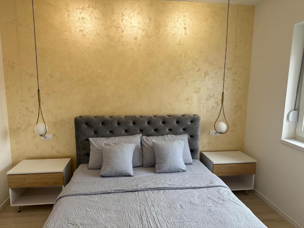 Postel nebo postele na pokoji v ubytování Cvetkovic apartman
