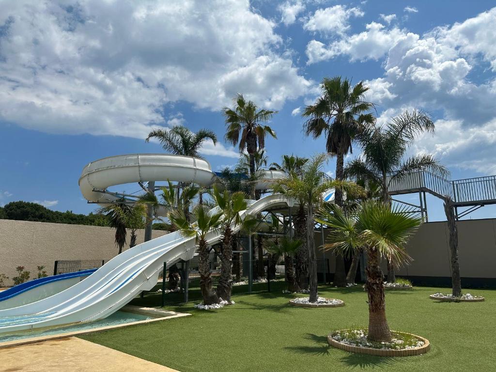 Photo de la galerie de l'établissement Maison 3ch piscine bord de mer village vacances, à Portiragnes