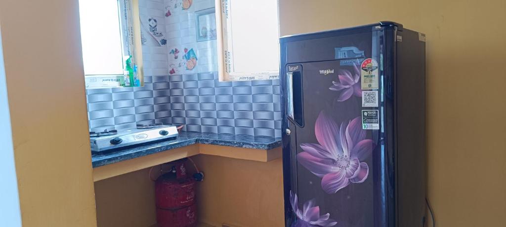 Köök või kööginurk majutusasutuses Beverly Dinesh Homestay