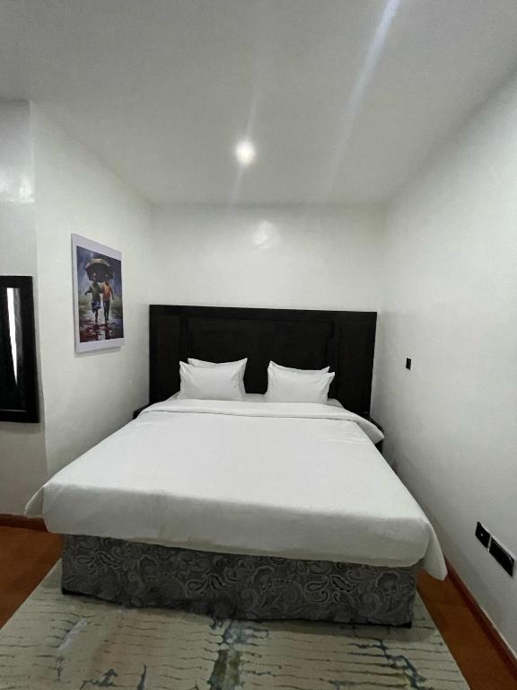 Voodi või voodid majutusasutuse PEPE Suites toas