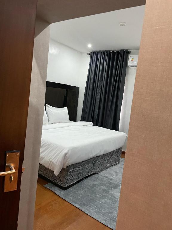 Voodi või voodid majutusasutuse PEPE Suites toas