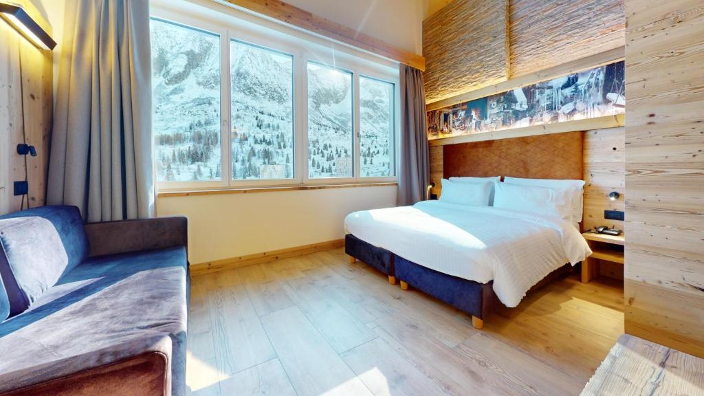 Posteľ alebo postele v izbe v ubytovaní Hotel Gardenia