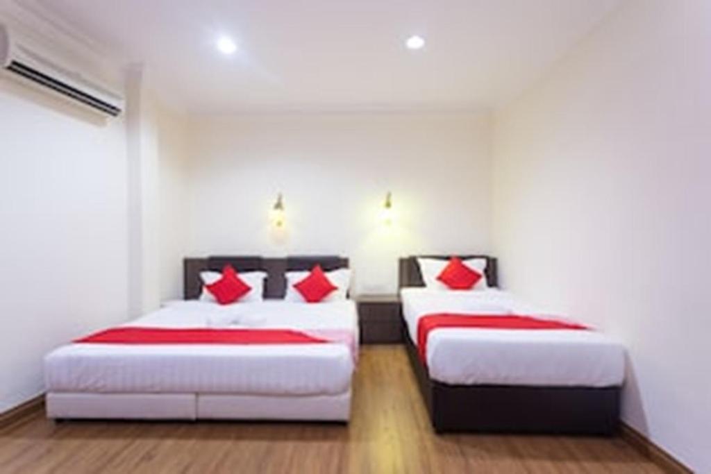 Postel nebo postele na pokoji v ubytování OYO 43915 T P Hotel