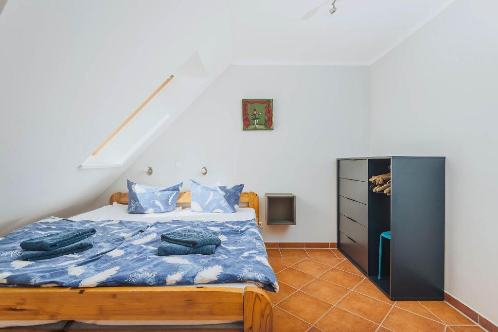 Postel nebo postele na pokoji v ubytování Kuddels Fischerhus 2