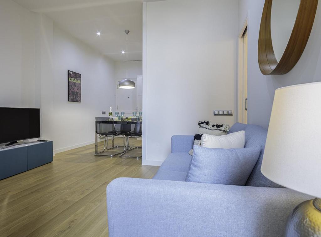 Televízia a/alebo spoločenská miestnosť v ubytovaní The Gaudi Suites II