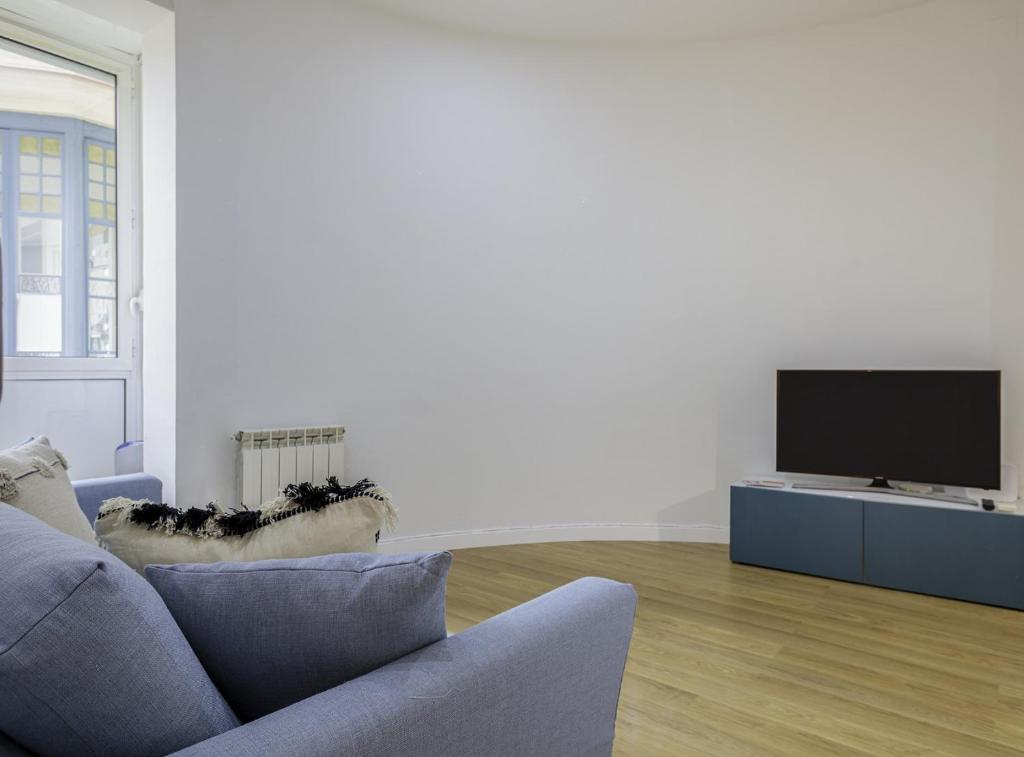 Televízia a/alebo spoločenská miestnosť v ubytovaní The Gaudi Suites II
