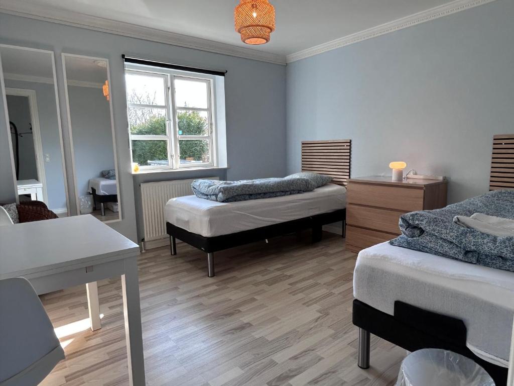 Postel nebo postele na pokoji v ubytování Piccobello Bed & Breakfast Valløby Køge