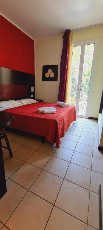 Posteľ alebo postele v izbe v ubytovaní Hotel Alibi