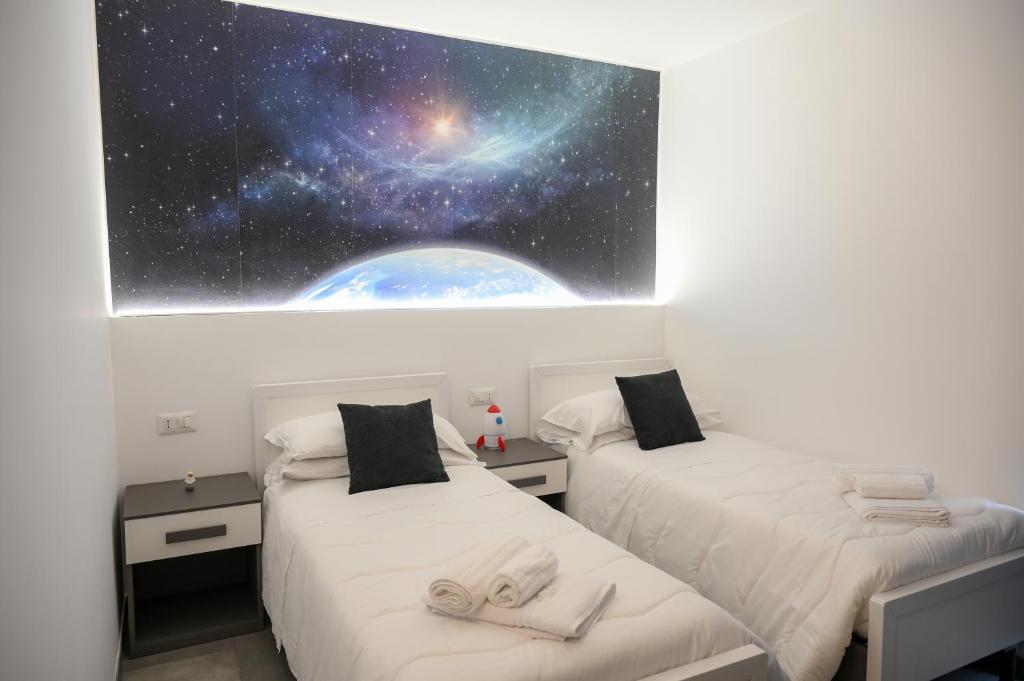 Postel nebo postele na pokoji v ubytování Karlin's house Anzi - albergo diffuso