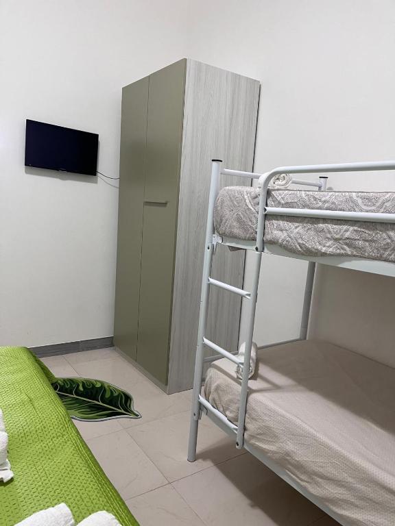Postel nebo postele na pokoji v ubytování B&B Andromeda
