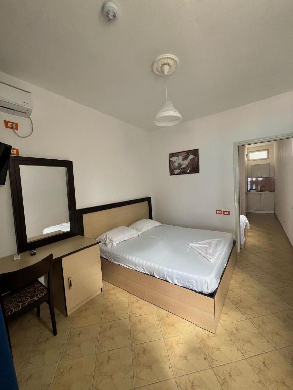 Postel nebo postele na pokoji v ubytování Hotel Jonufra