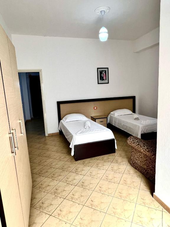 Postel nebo postele na pokoji v ubytování Hotel Jonufra