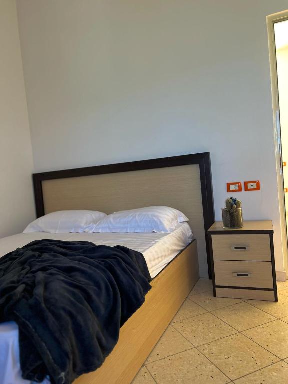 Postel nebo postele na pokoji v ubytování Hotel Jonufra
