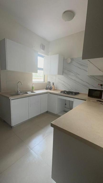 Kuchyň nebo kuchyňský kout v ubytování 1 bedroom Loft