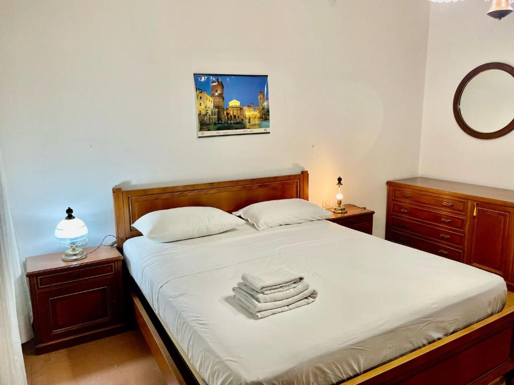 Postel nebo postele na pokoji v ubytování FAMAGOSTA Home