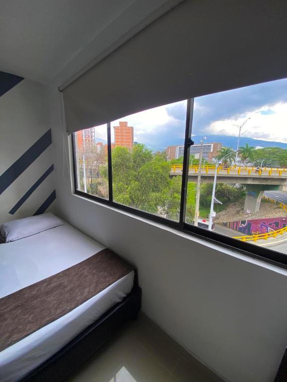 Postel nebo postele na pokoji v ubytování 33 Hotel Bulerias