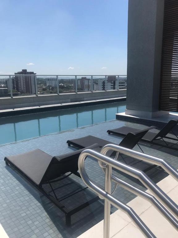 Bazén v ubytování Loft confortável com garden nebo v jeho okolí