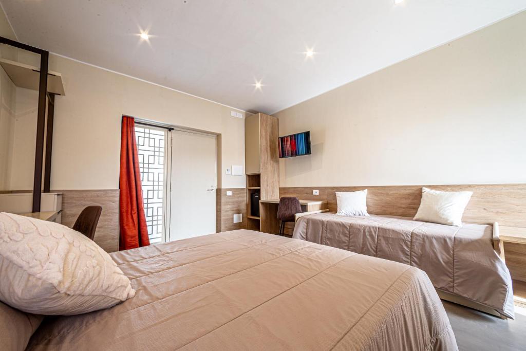 Postel nebo postele na pokoji v ubytování 4Rooms
