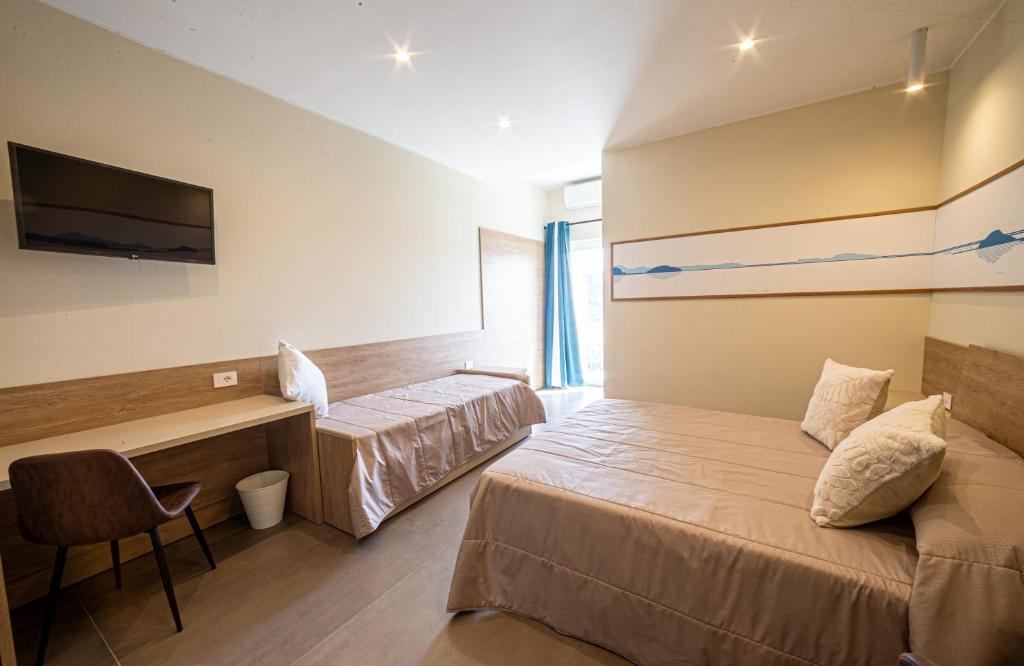 Postel nebo postele na pokoji v ubytování 4Rooms