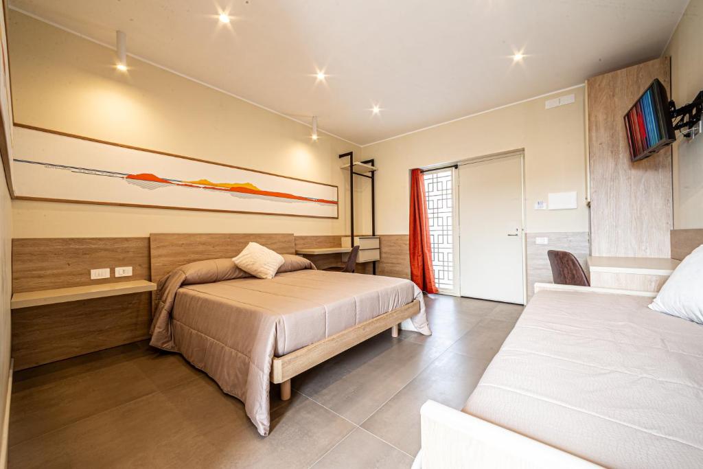 Postel nebo postele na pokoji v ubytování 4Rooms