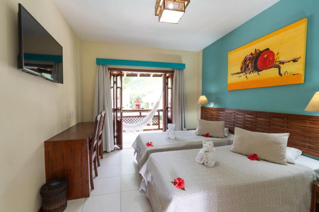 Cama ou camas em um quarto em Terra Boa Hotel Boutique
