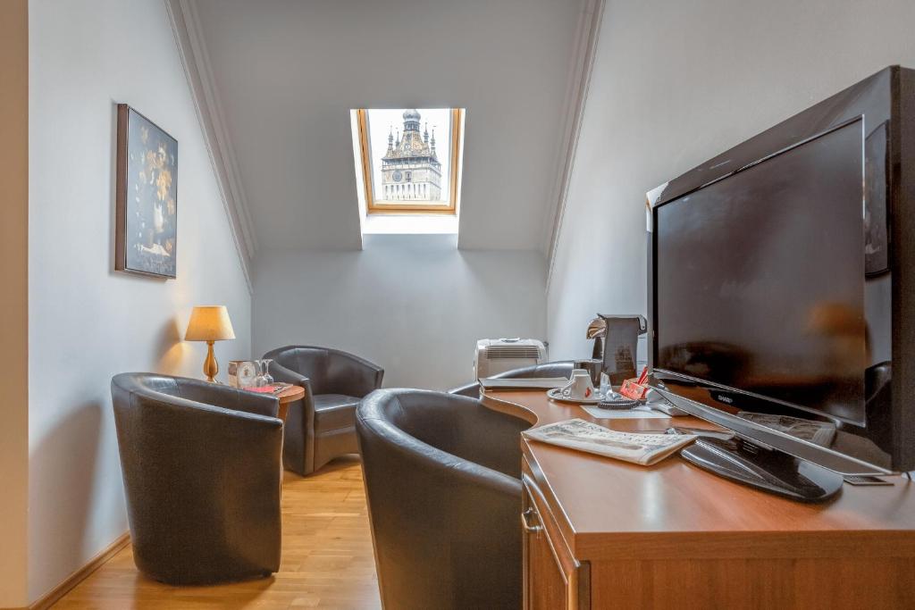 TV a/nebo společenská místnost v ubytování Hotel Boutique Bulevard