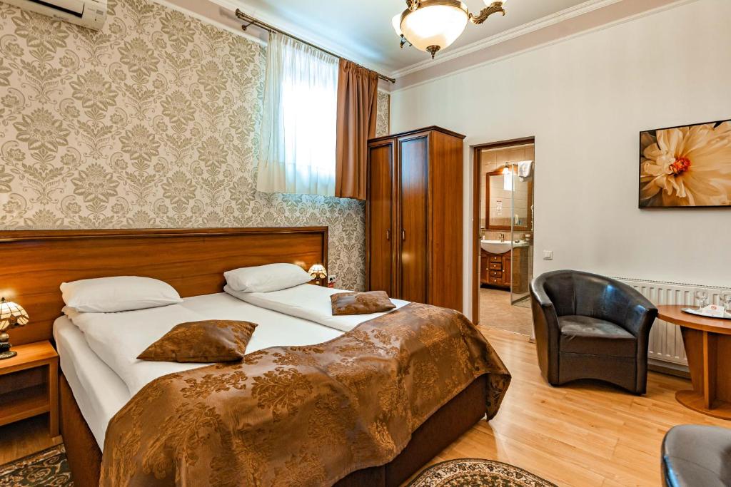 Postel nebo postele na pokoji v ubytování Hotel Boutique Bulevard