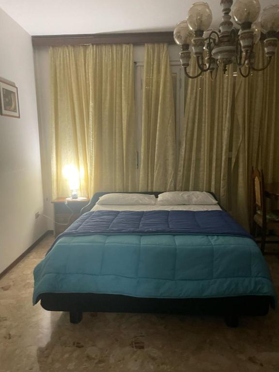 Postel nebo postele na pokoji v ubytování FAMAGOSTA Home